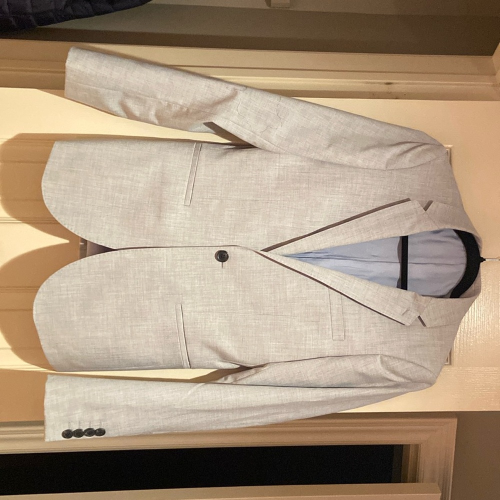 Topman Men’s grey suit jacket with button detailing. Brand new size 34.